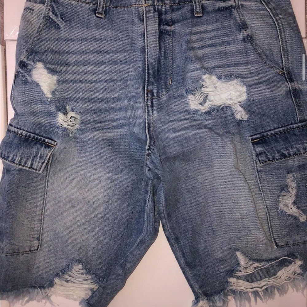 Distressed blue bermuda shorts